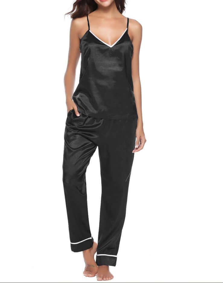 Comfortable black silk sling plus trousers pajamas for women, perfect for relaxation and sleepwear.