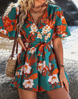 Women's Beach Vacation Ruffle Sleeve Short Culottes Printed Jumpsuit with floral design, perfect for summer outings.