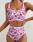 Women's sexy floral bikini swimsuit with high waist and purple detailing, perfect for pool or beach.