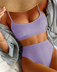 High waist bikini swimwear for women in lavender, featuring ribbed detailing and stylish spaghetti straps.