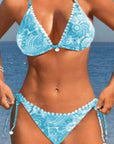 Women's swimwear: colorful bikini split swimsuit with paisley print, ideal for swimming and wading by the beach.