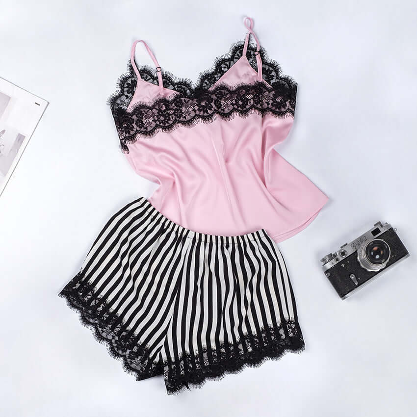 Pink and black striped silk satin pajamas for women, featuring lace trim and soft fabric, ideal for summer home wear.