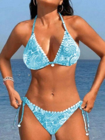 Women's bikini swimsuit in blue paisley print, perfect for swimming and beach outings.