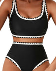 Black women's swimwear bikini with scalloped edges, perfect for swimming and wading. Available in various sizes.
