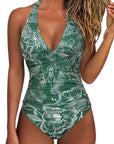 Women's multicolor backless lace-up swimsuit in green floral design, perfect for summer beachwear.