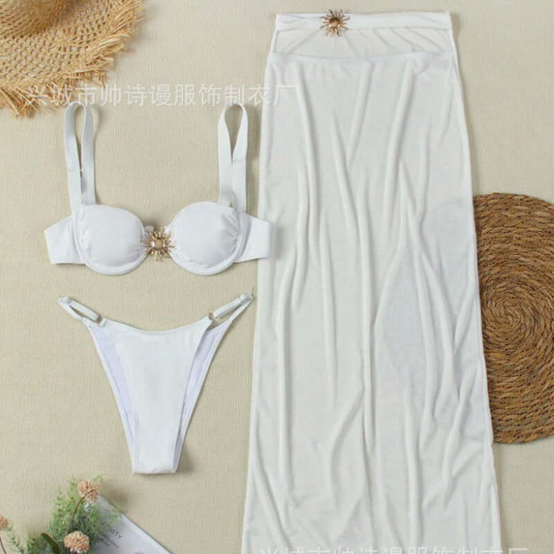 Three-piece women's swimswear set featuring a banded bikini top, trendy T pants, and a stylish skirt in white.