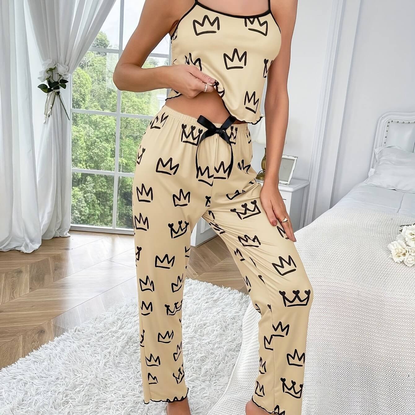 Two-piece milk silk suspender pajamas in beige with crown print, perfect for casual and comfortable wear at home.