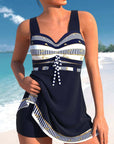 Plus size women's swimwear with navy and striped design, perfect for summer beach outings.