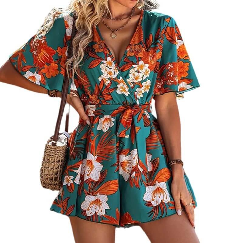 Women's summer jumpsuit with ruffle sleeves and floral print, perfect for beach vacations and casual outings.