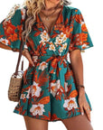 Women's summer jumpsuit with ruffle sleeves and floral print, perfect for beach vacations and casual outings.