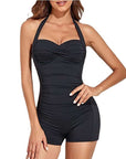 Elegant women's swimwear: black solid color one-piece boxer bikini, featuring a ruched design for a flattering fit.