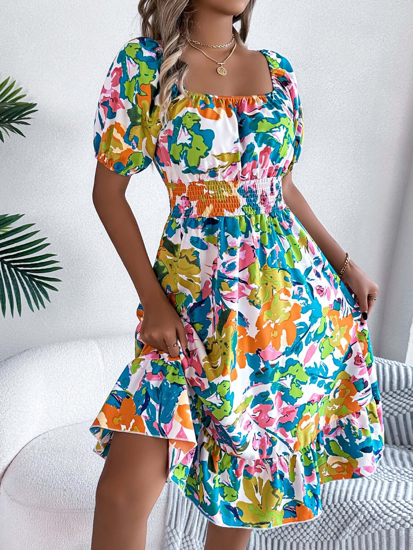 Colorful floral A-line dress with square neckline and ruffles, perfect for summer casual wear.
