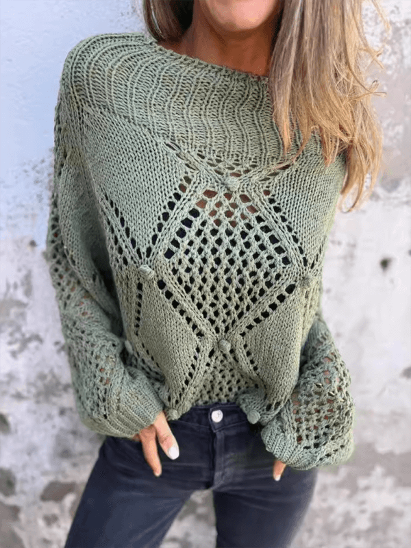 Casual loose-knit sweater in olive green with round neck and open weave detailing, perfect for autumn-winter style.