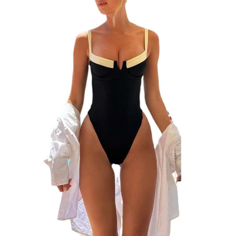 Women's contrast color one-piece swimsuit bikini in black and cream, perfect for summer swimwear.
