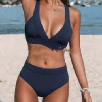 Women's solid color sexy slim bikini in navy blue, perfect for summer beach days and poolside lounging.