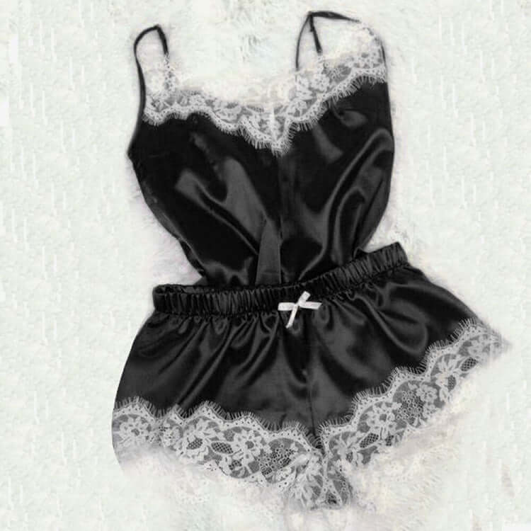 Black satin women's pajamas jumpsuit with lace detail from Little Miss Vanilla Clothing UK.