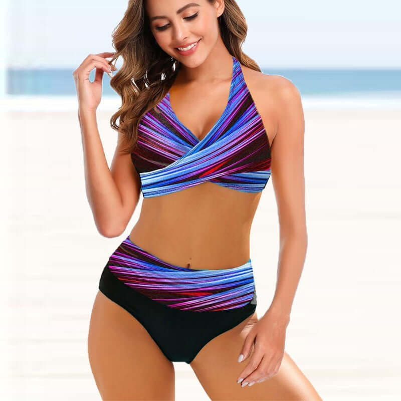 Women's swimwear: European and American ladies striped tie-dye bikini swimsuit on beach.