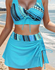 Split halter bikini swimsuit for women in vibrant turquoise, perfect women's swimwear for summer beach days.