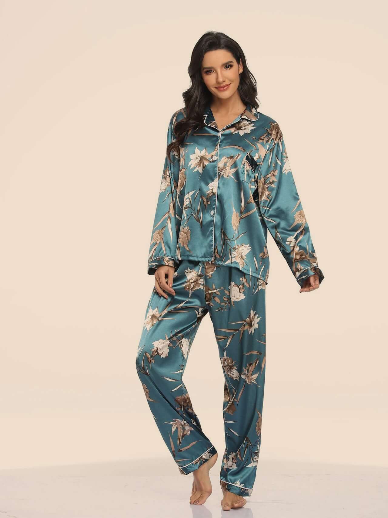 Two-piece stretch satin women's pajamas in teal with floral design, perfect for comfort and style at home.