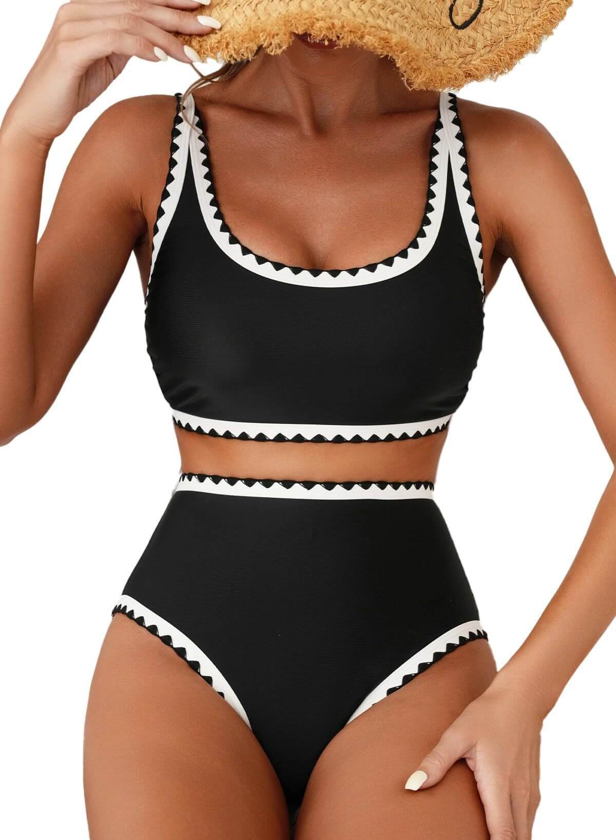 Women's black bikini swimsuit with contrasting white trim, perfect for swimming and beach activities.