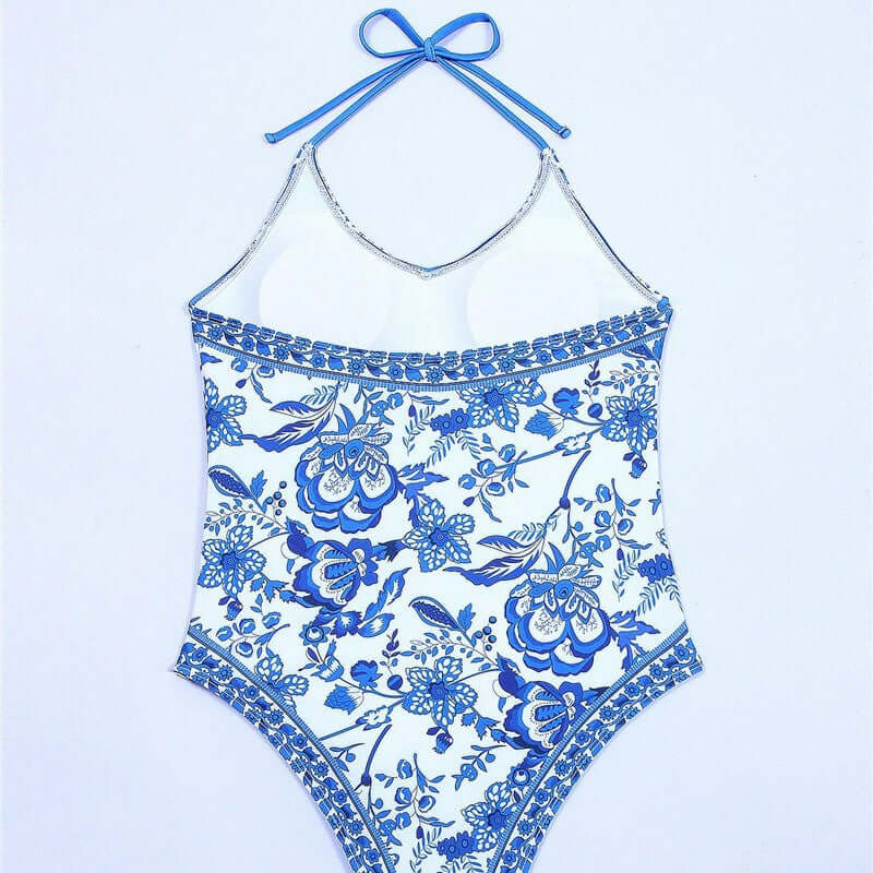 European American Fashion Floral Print Halter Backless Swimsuit for women's swimwear, featuring elegant blue floral design.