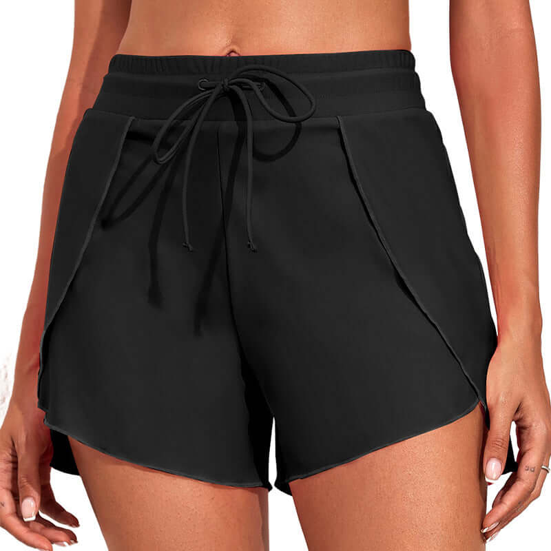 Quick-drying high waist women's swimming trunks in solid black, perfect for summer beach activities.