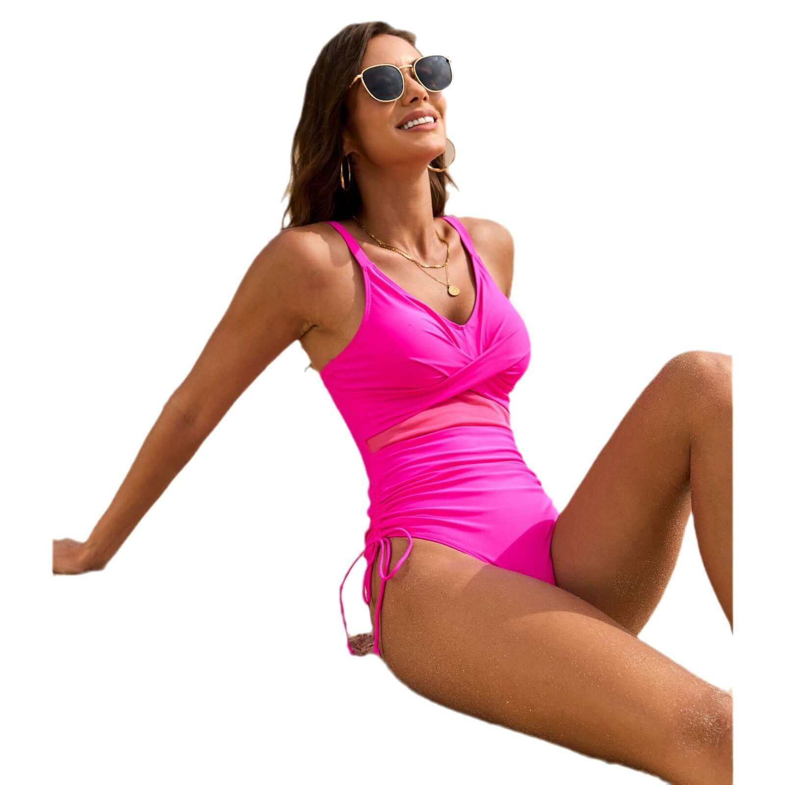 Woman in a pink one-piece swimsuit enjoying the sun, perfect for swimming and beach activities. Women's swimwear.