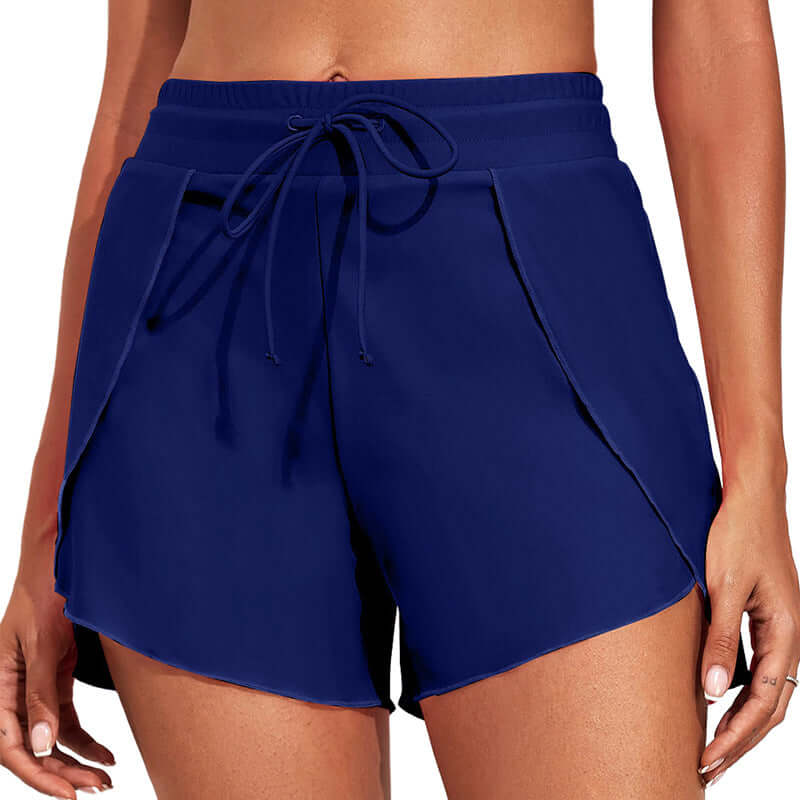 Quick-drying high waist women's swim trunks in solid navy, perfect for summer beach adventures.