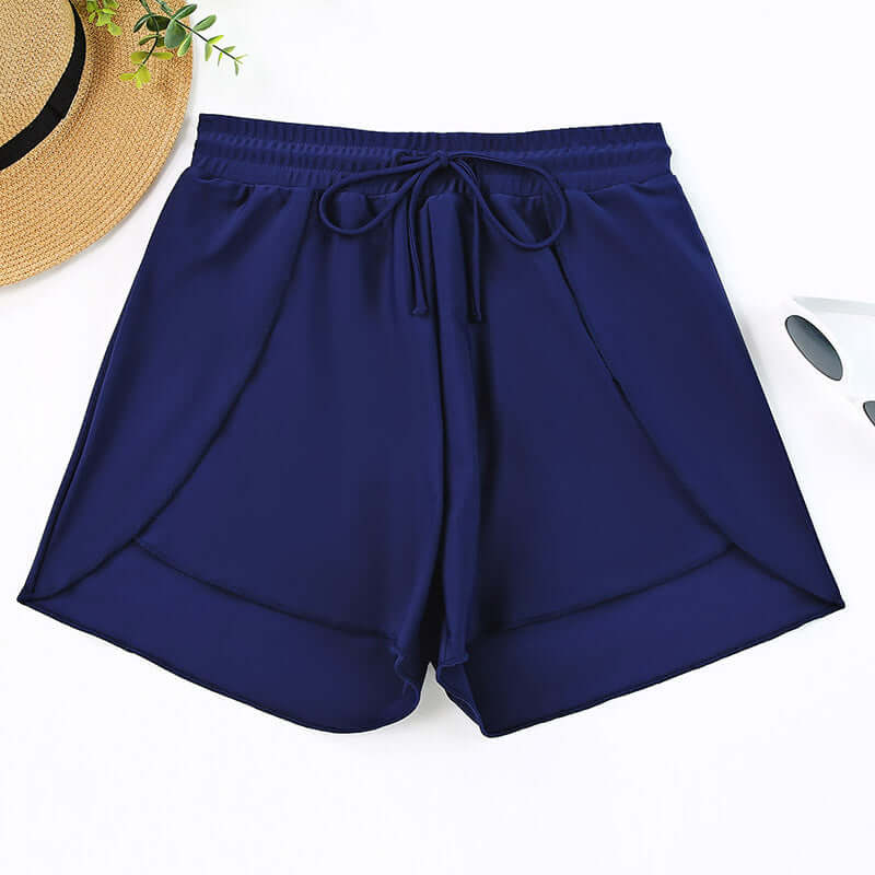Quick-drying high waist women's swimwear shorts in navy blue for summer vacations.