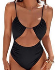 Stylish black women's one-piece swimsuit with cut-out design, perfect for beach and pool activities.