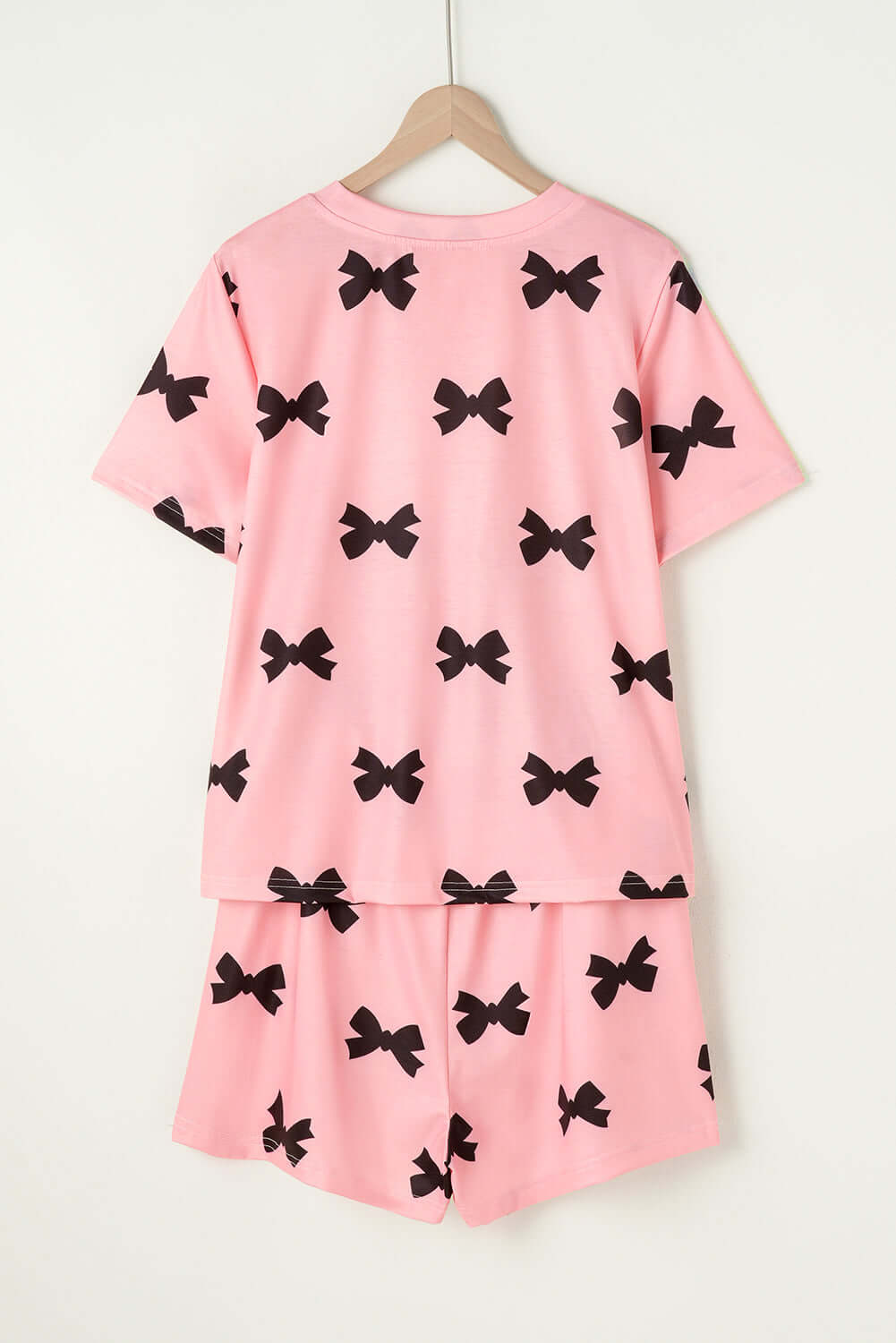 Pink bow printed short lounge set for women, featuring a t-shirt and shorts design, perfect for comfortable PJs.