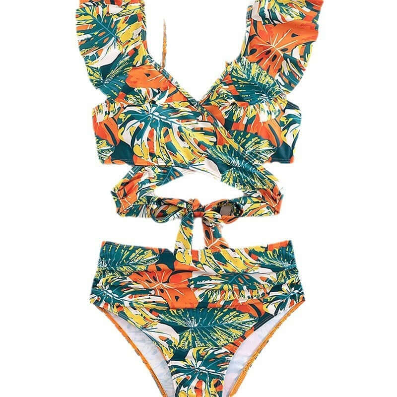 Women's two-piece ruffled halter bikini swimsuit in tropical print with orange and green leaves