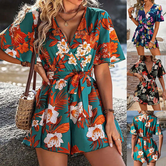 Stylish Beach Vacation Ruffle Sleeve Short Culottes Jumpsuit in vibrant floral print, perfect for women's summer outfits.