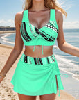 Stylish women's swimwear featuring a turquoise halter bikini and matching skirt, perfect for summer beach outings.