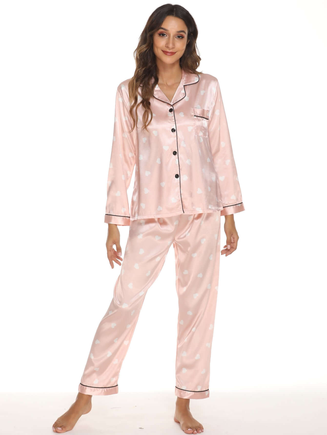 Two-piece stretch satin pajamas for women in pink with heart print, perfect for home wear and cozy evenings.