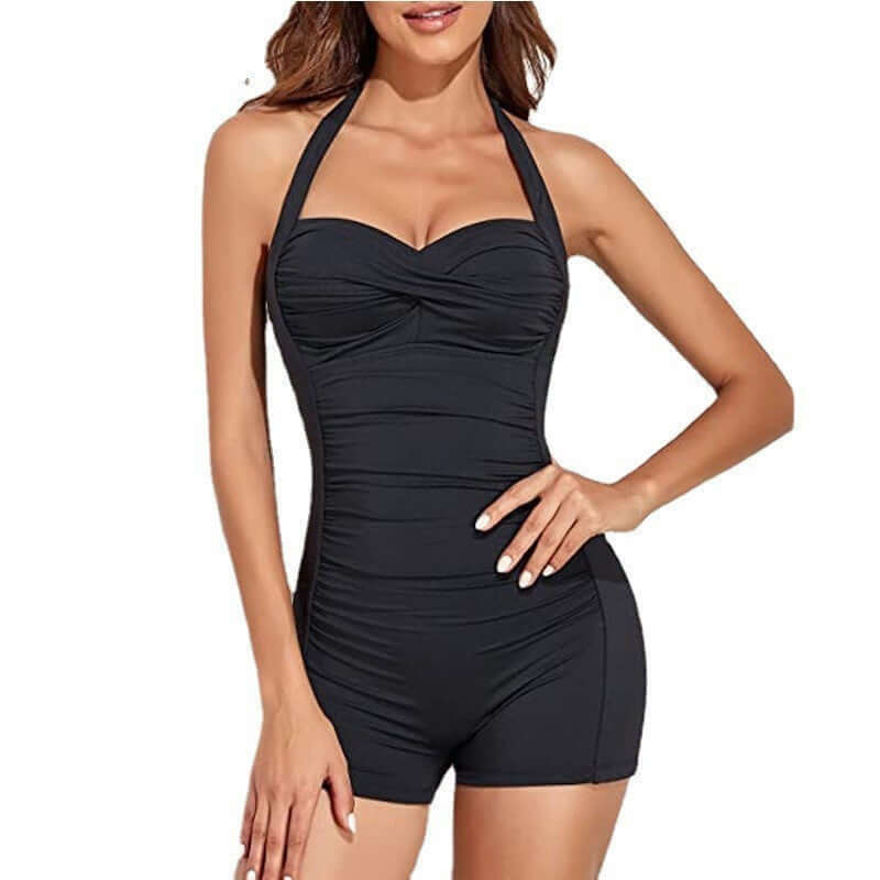Elegant women's swimwear: black solid color one-piece boxer bikini, featuring a ruched design for a flattering fit.