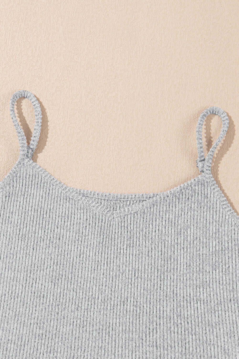 Light grey ribbed camisole top from women's lounge set, featuring adjustable straps and comfortable fabric.