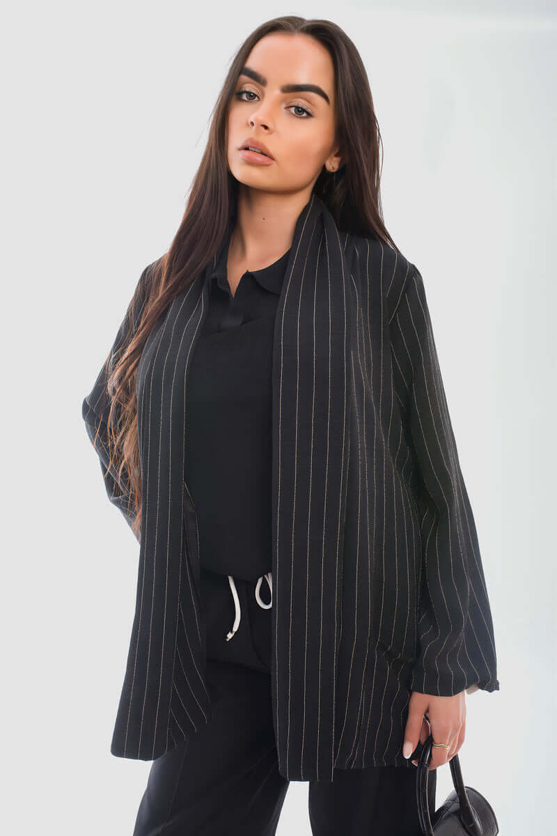 Leslie oversized striped long sleeve cardigan with pockets, stylish and cozy for chilly days, perfect with jeans or leggings.