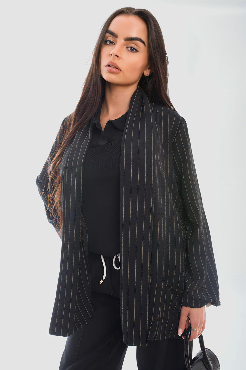 Leslie oversized striped long sleeve cardigan with pockets, stylish and cozy for chilly days, perfect with jeans or leggings.