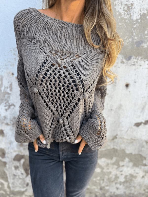 Casual loose-knit gray sweater with round neck and unique design, perfect for autumn and winter wear.