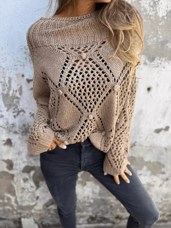 Casual loose knit sweater in beige with a round neck and unique lattice design, ideal for autumn and winter fashion.